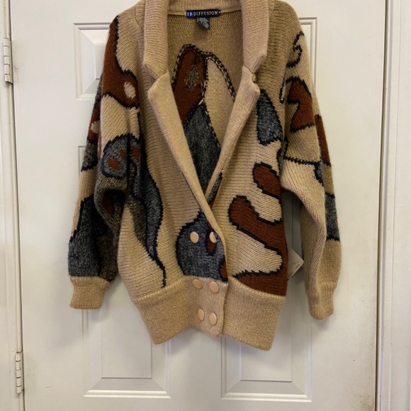 A medium warm wool button up sweater. - Picture 5 of 6